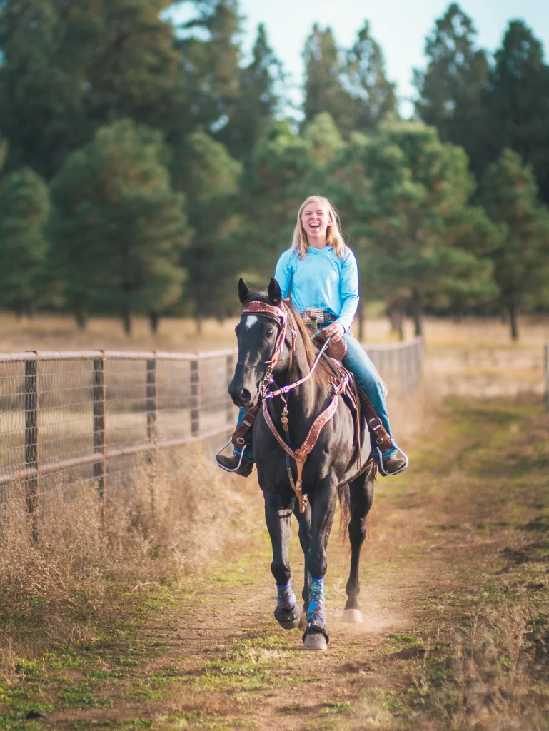 A Gloryview Church member riding a horse at Gloryview Ranch.